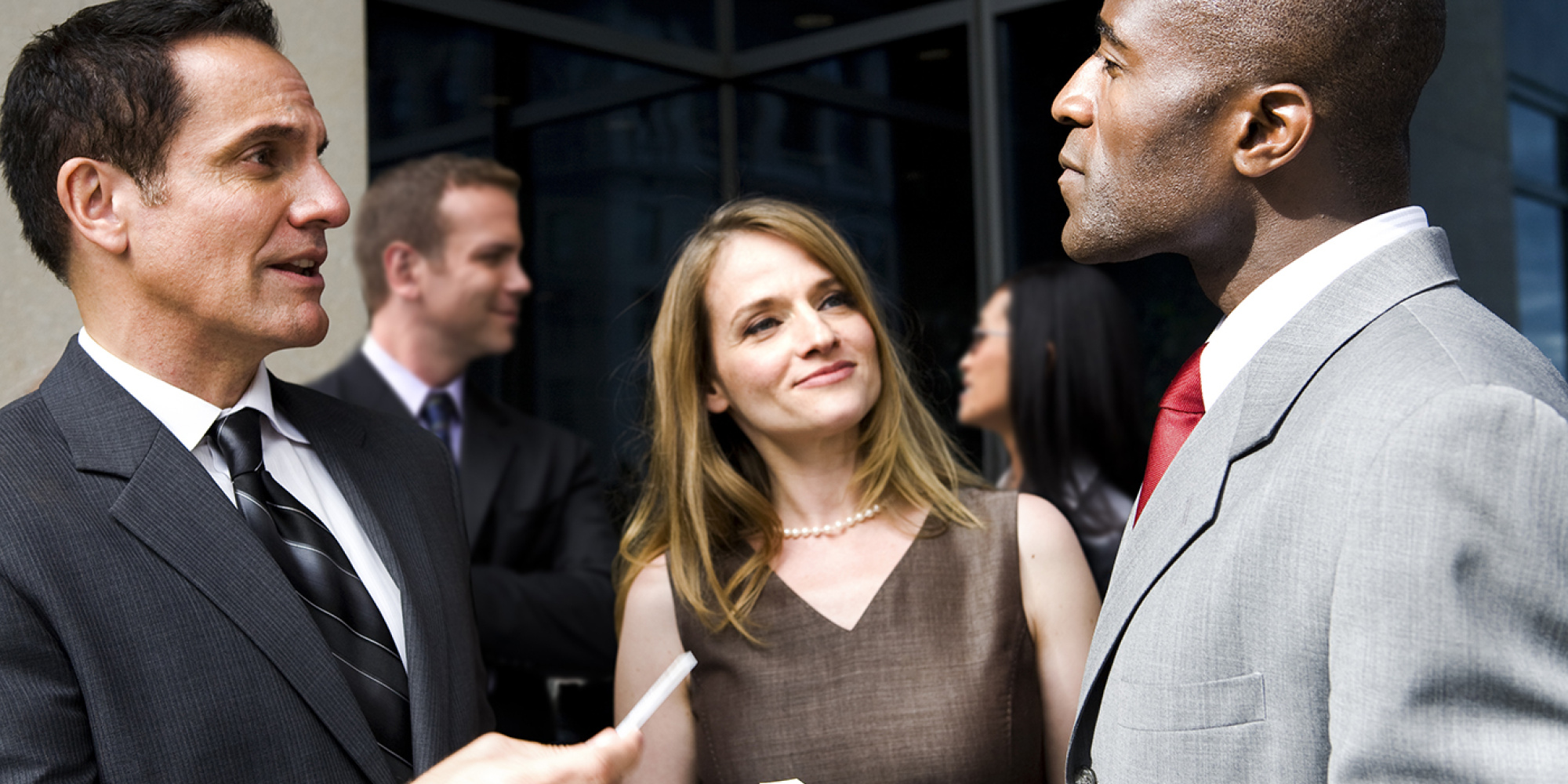 People exchanging business cards