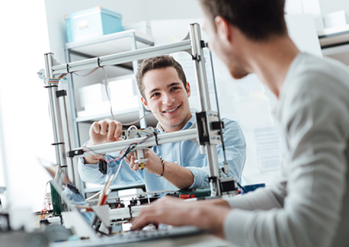 Engineering students working in the lab