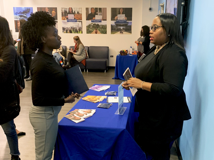 Student and employer representative at the Policy and Social Impact Showcase.