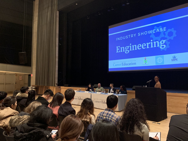 Students watching panelists speak at the Engineering Industry Showcase.