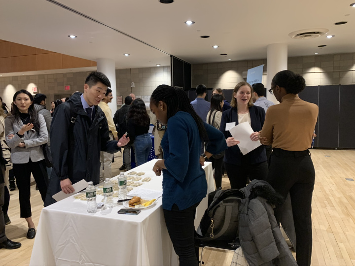 Employers speaking with students. 