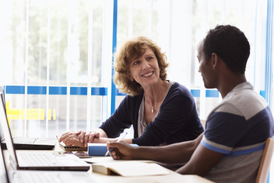 Student teacher discussion - Stock image.jpg 