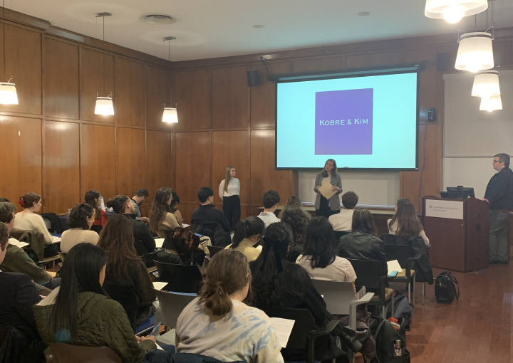 An employer presents in front of a student audience