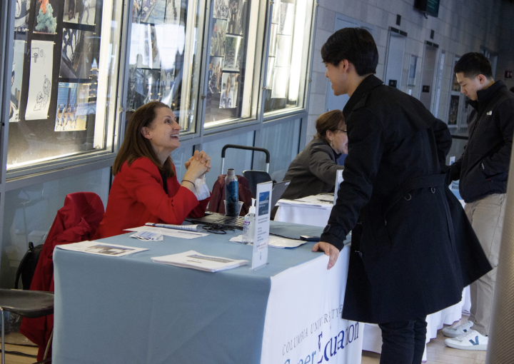 Career Counselor Greeting a Student